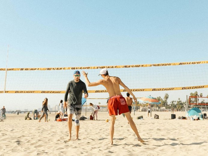People playing beach volleyball at Belmont Shore in Long Beach