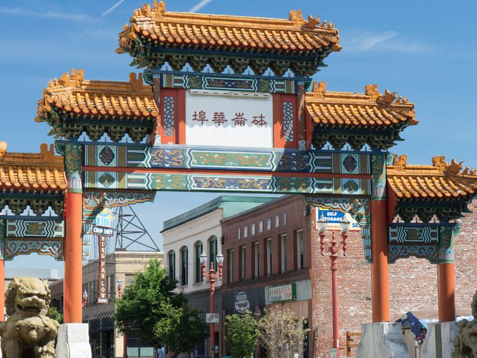 International district entrance with Chinese temple and writing as the archway in Seattle