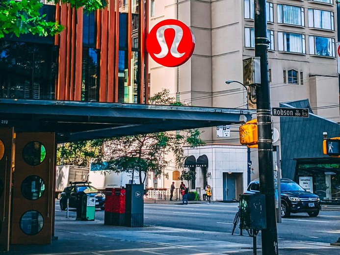 Lululemon sign on a storefront located on Robson Street in Vancouver