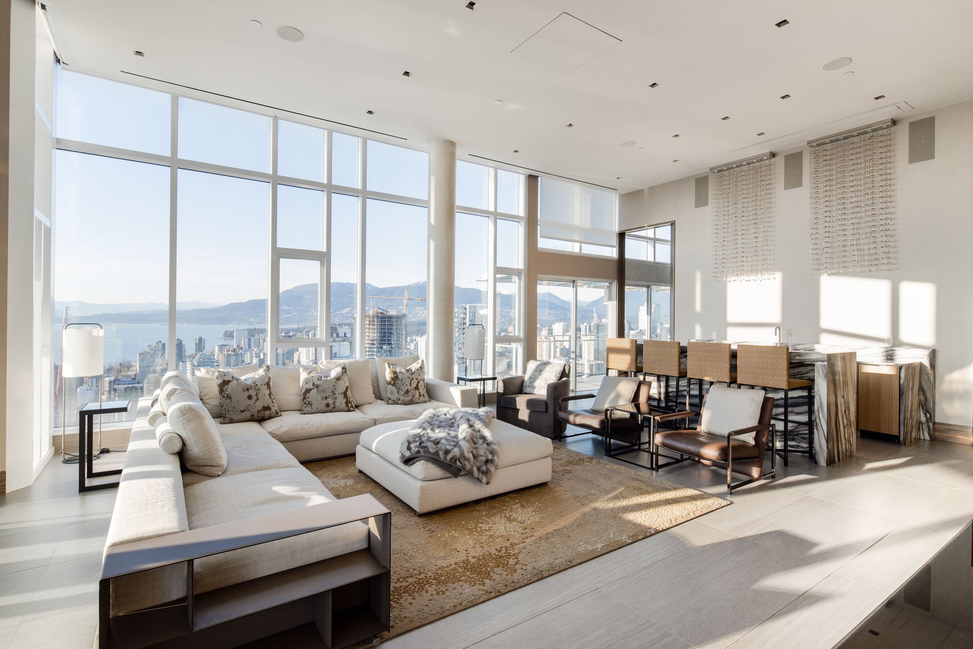the mark penthouse featuring spacious living room with vancouver stunning views