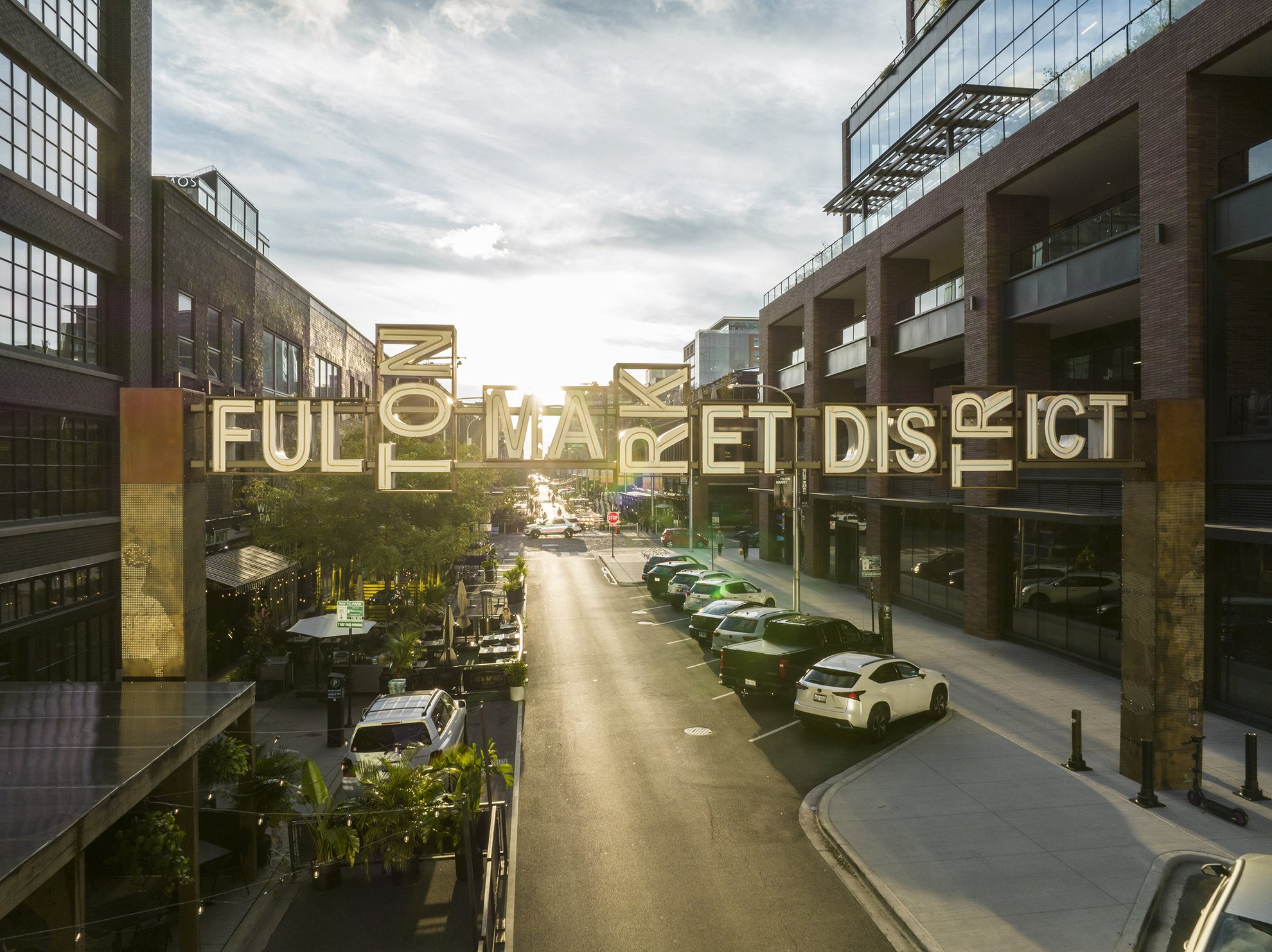 View of Chicago's Fulton Street and Fulton Market sign at dusk