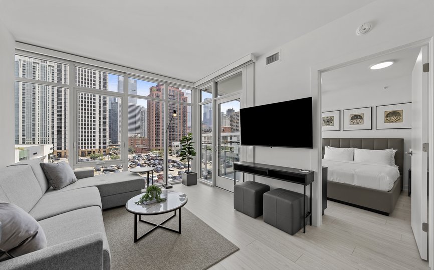 junior two bedroom suite featuring living area with chicago city view at fulton market